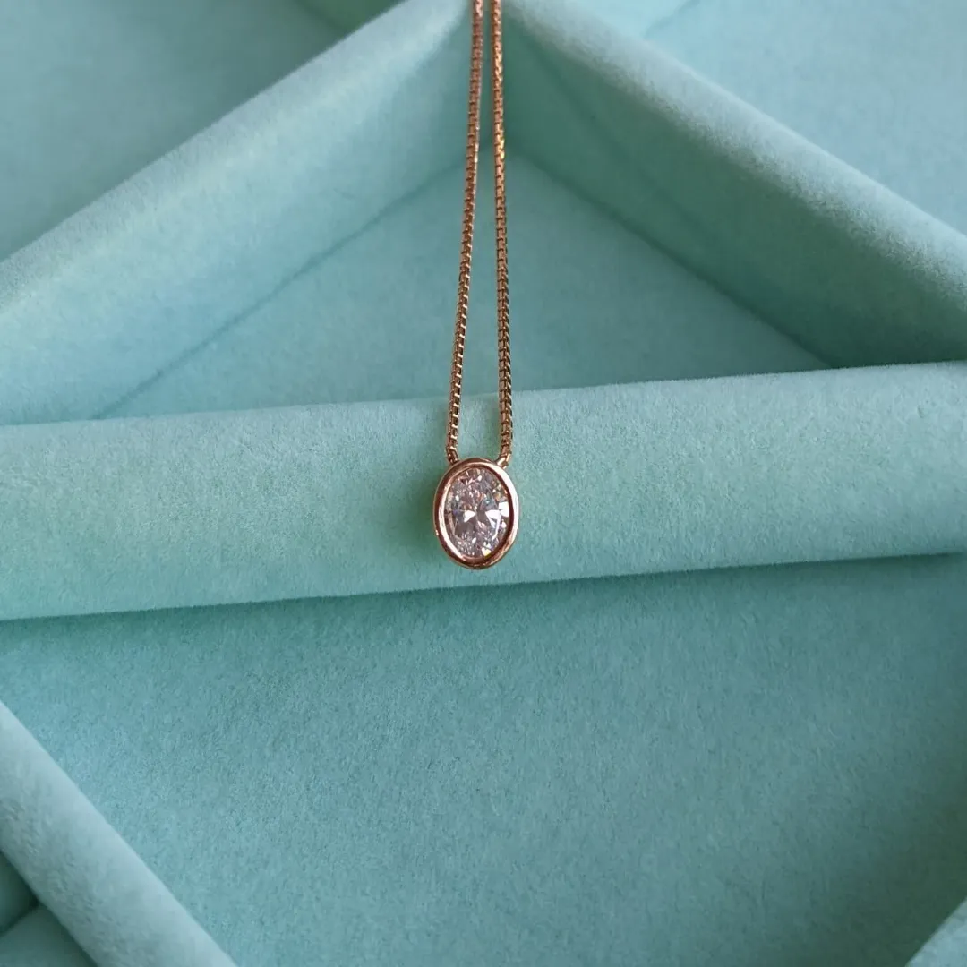 /public/photos/live/Oval Cut Dainty Moissanite Diamond Pendant  485 (2).webp